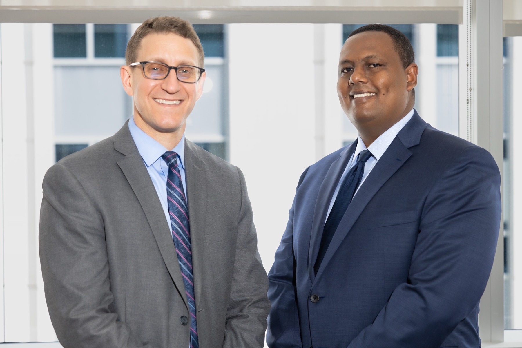Chad Mason, Esq. and Kahn Kassegn, Esq., partners at MK Law, P.A.